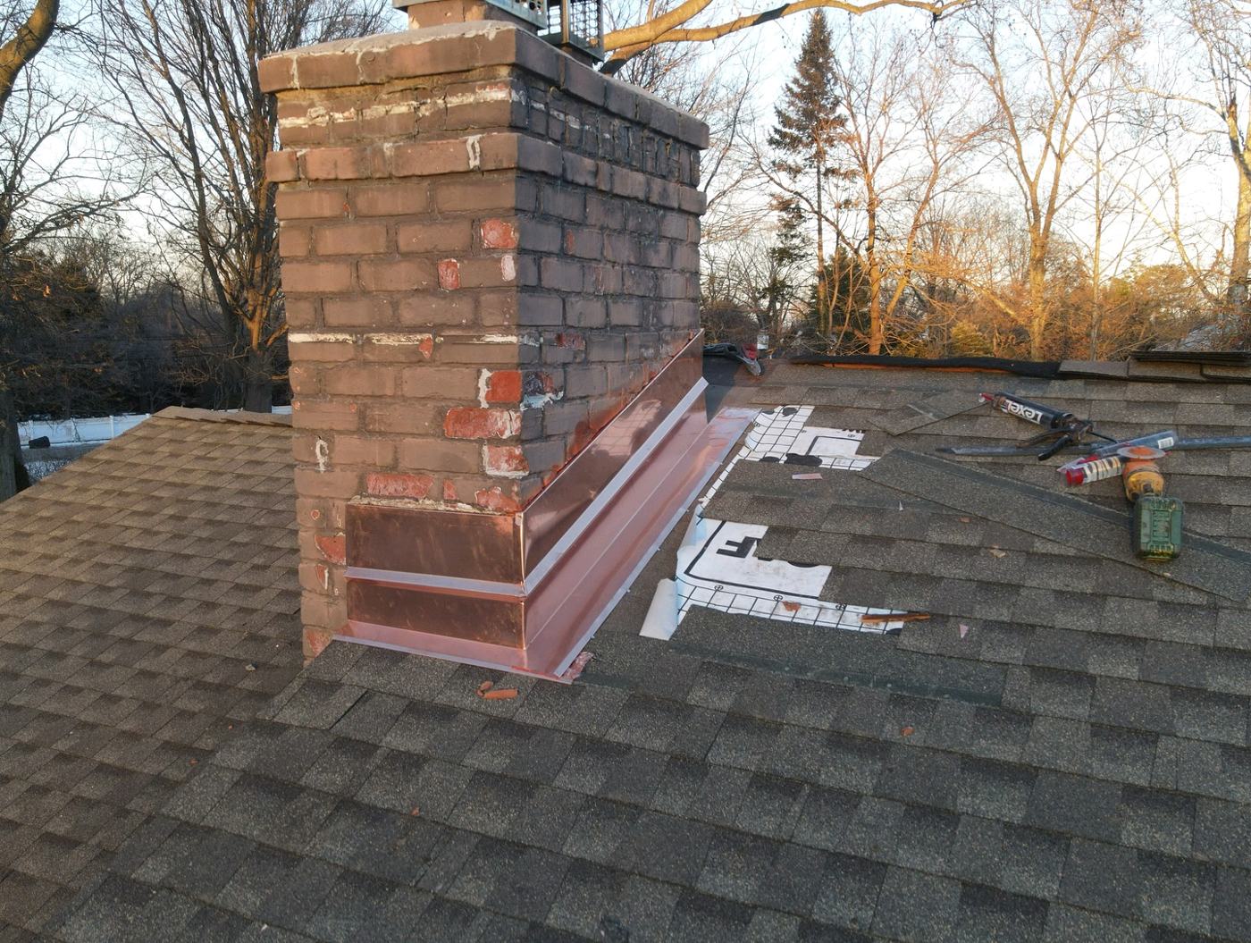 Finished roof with custom copper flashing